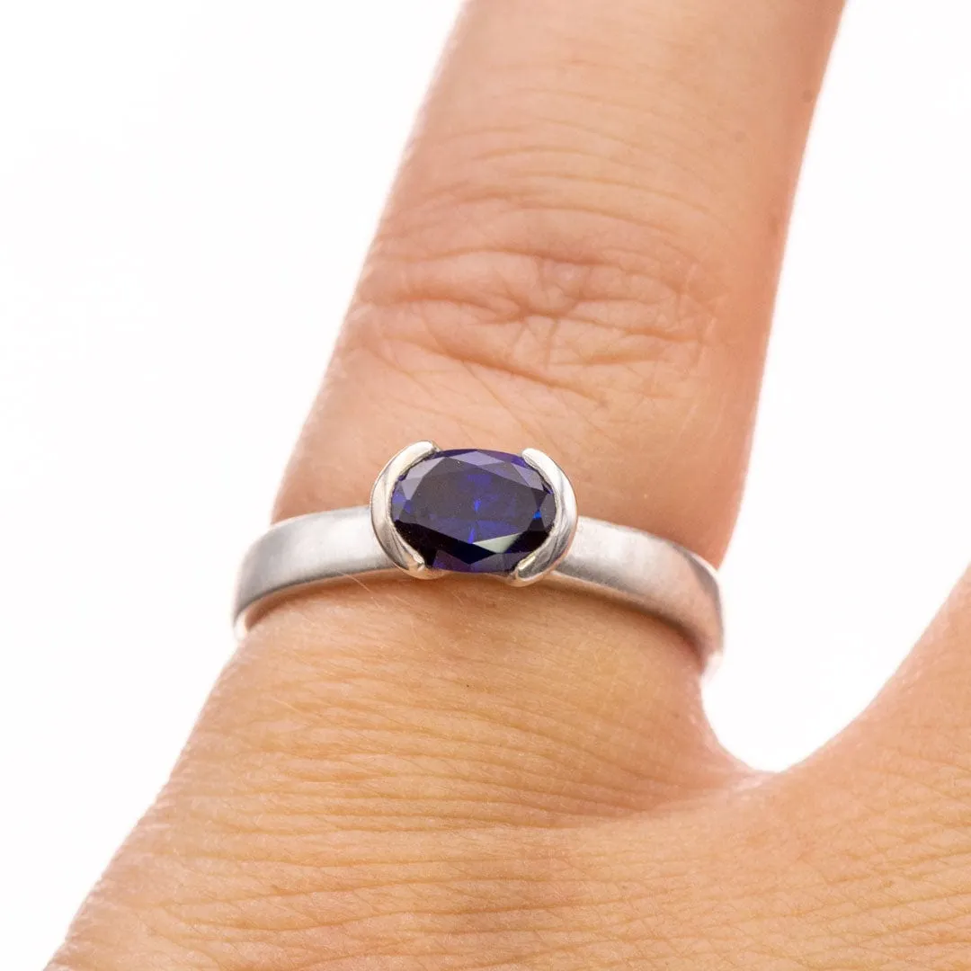 Lab Created Oval Blue Sapphire Half Bezel Sterling Silver Solitaire Ring, Ready to Ship