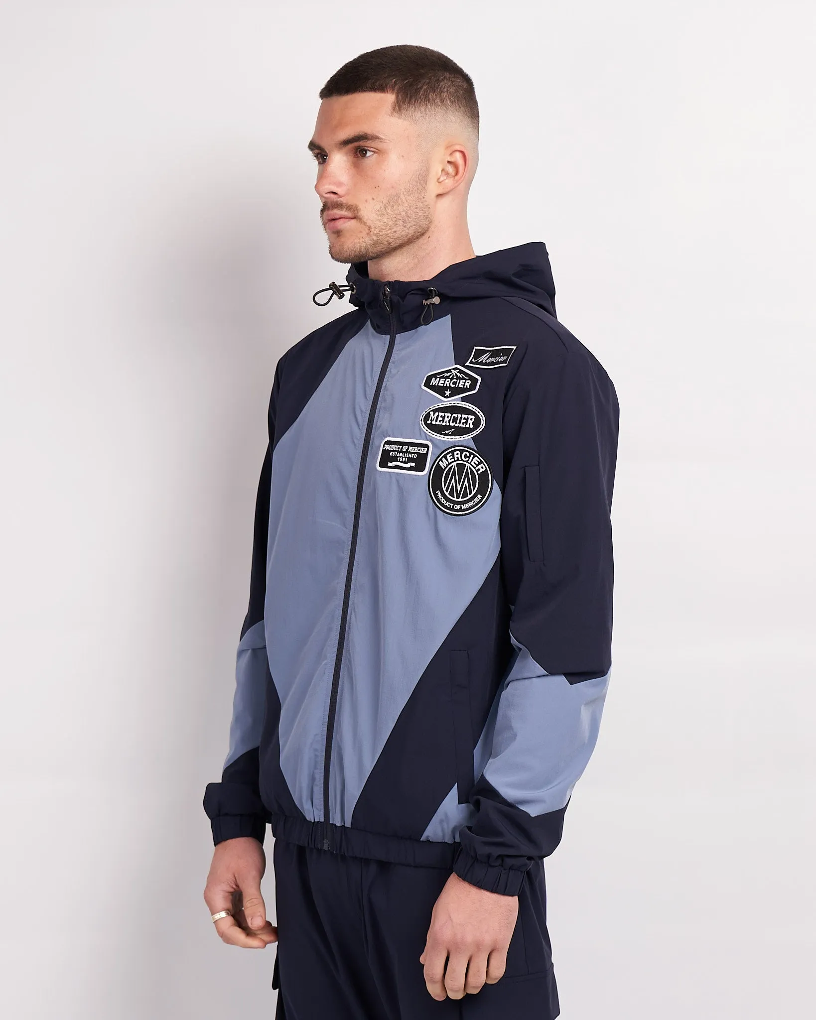 Navy Placid Blue Mono Badge Panelled Windbreaker