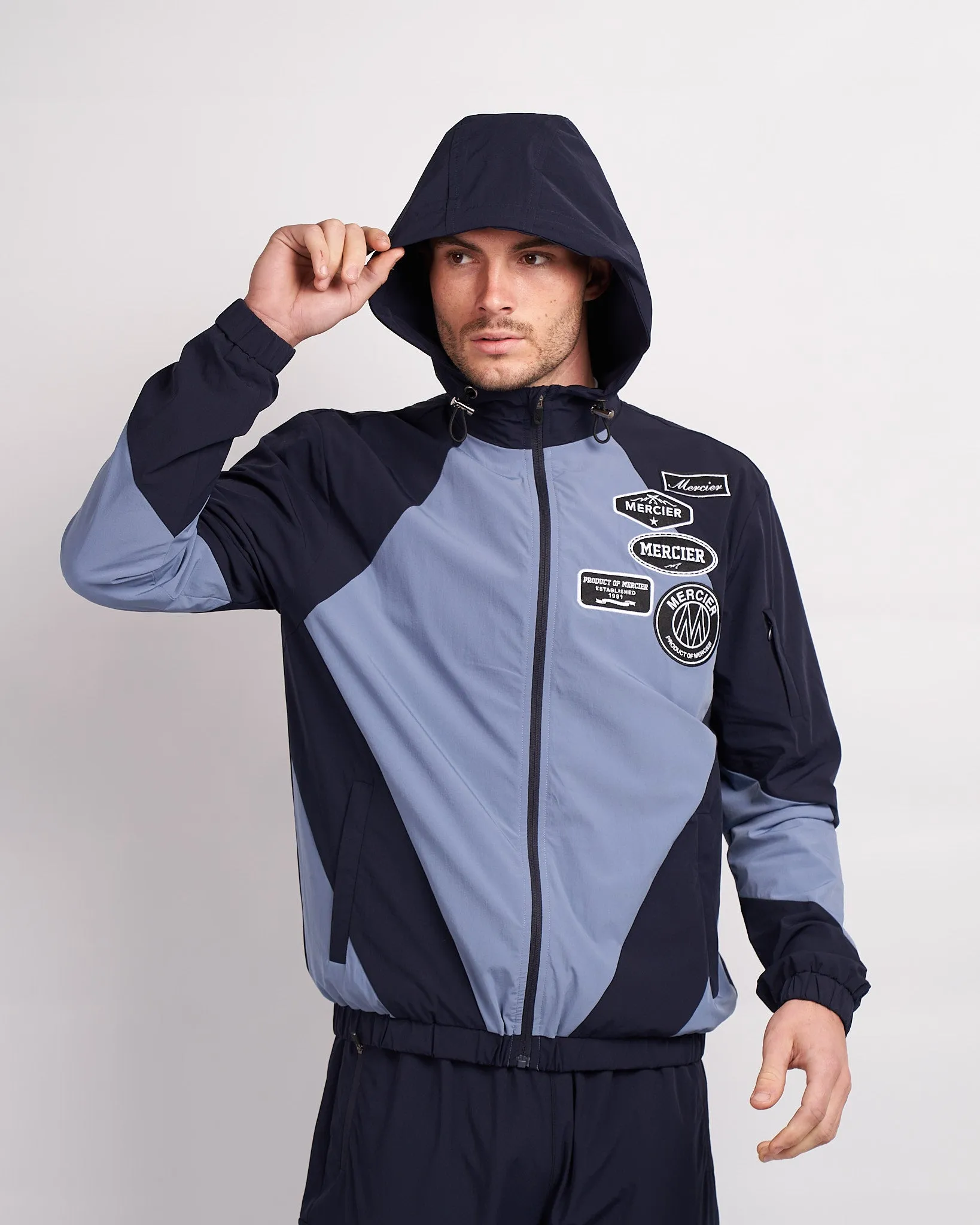 Navy Placid Blue Mono Badge Panelled Windbreaker